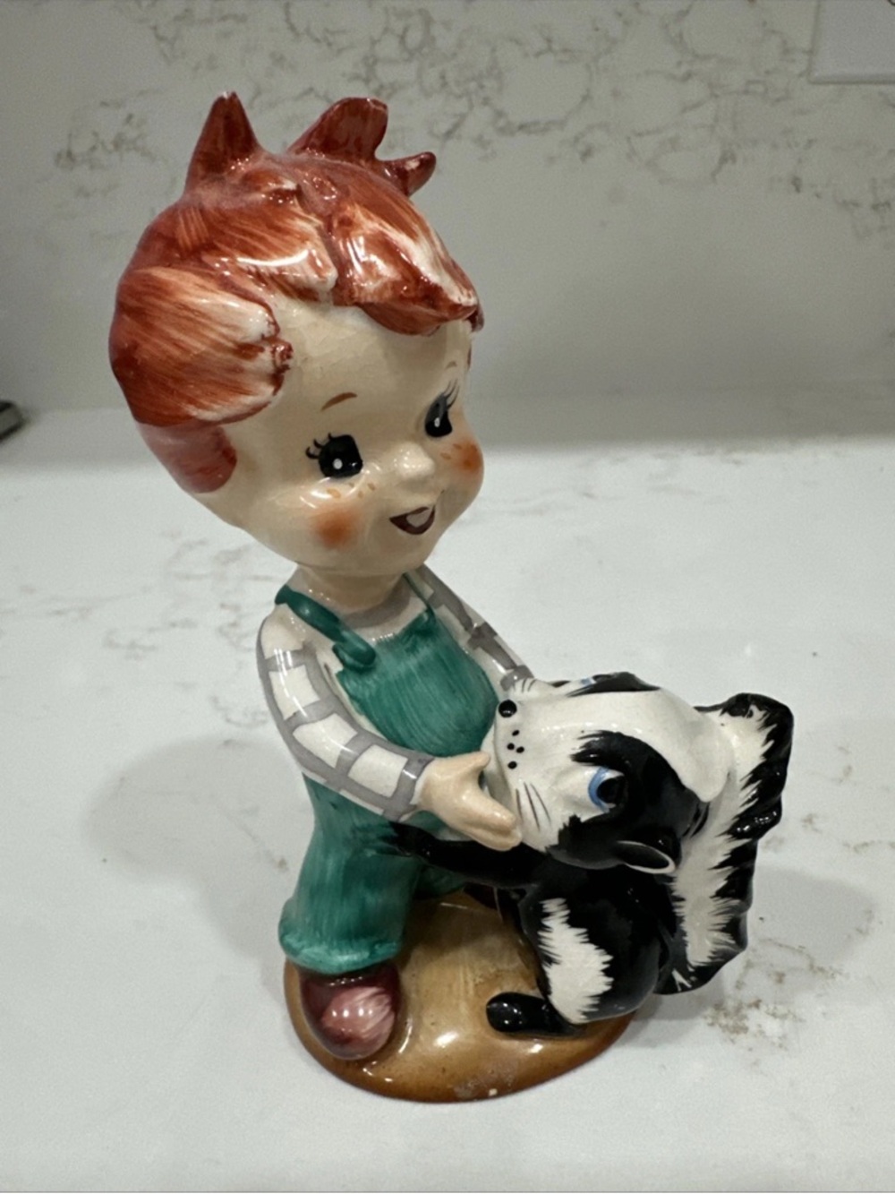 Red Headed Freckled Boy with Skunk Vintage Figurine Made in Japan